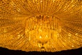 Illuminated crystal chandelier with warm light Royalty Free Stock Photo