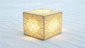 Illuminated Cube Lamp with Golden Pattern on Marble Surface Royalty Free Stock Photo
