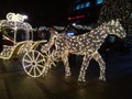 Illuminated decorative New Year\'s carriage placed in the main street of Belgrade