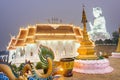 Nighttime at Wat Huay Pla Kang temple,lit up,with Big Buddha towering beyond,Chiang Rai City,Thailand Royalty Free Stock Photo