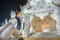 Nighttime at Wat Huay Pla Kang temple,lit up,with Big Buddha towering beyond,Chiang Rai City,Thailand Royalty Free Stock Photo