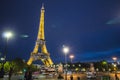 Illuminated Eiffel tower in the evening, Paris