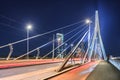 The illuminated Erasmus Rotterdam bridge at nighttime