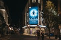 Illuminated facade of Cambirdge Theatre located on Seven Dials, London, UK, showing Matilda musical