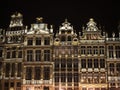 Illuminated facade of historic buildings at Grand Place Grote Markt central main square in Brussels Belgium Europe Royalty Free Stock Photo