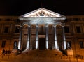 Illuminated facade of the Spanish Parliament building in Madrid