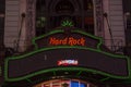 Illuminated facades of Broadway stores and theaters