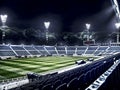 Empty soccer stadium in light rays at night