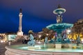 Illuminated fountain with Column of Pedro IV at Rossio Square in Lisbon, Portugal Royalty Free Stock Photo