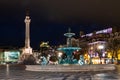 Illuminated fountain with Column of Pedro IV at Rossio Square in Lisbon, Portugal Royalty Free Stock Photo