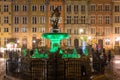 Illuminated fountain of the Neptune in Old Town of Gdansk at night. Poland Royalty Free Stock Photo