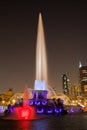 Illuminated Fountain and Skyline at Night in Chicago, Illinois