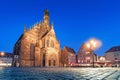 illuminated Frauenkirche Church on the market square at night in Nuremberg. Tourist attractions in Germany Royalty Free Stock Photo