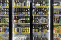 Illuminated glass showcase with a large assortment of beer. Front view. Moscow, Russia, 12-24-2020