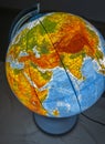 An illuminated globe as an educational gift for children, arousing curiosity about the world