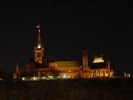 Illuminated gothic revival government buildings on Pariament hill, at night. Ottawa