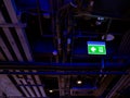 Illuminated green fire exit LED light sign Royalty Free Stock Photo
