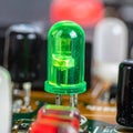 Illuminated Green LED on an Electronic Circuit Board Royalty Free Stock Photo