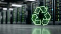 Green recycling symbol illuminated in a modern data center with server racks in the background Royalty Free Stock Photo