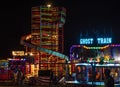 Illuminated, helter skelter ride at a funfair. 3 Royalty Free Stock Photo