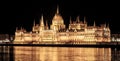 Illuminated historical building of Hungarian Parliament on Danube River Embankment in Budapest by night Royalty Free Stock Photo