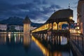 Illuminated historical Chapel Bridge at twilight Royalty Free Stock Photo