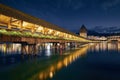 Illuminated historical Chapel Bridge at twilight Royalty Free Stock Photo