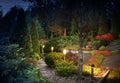 Illuminated home garden path patio lights autumns Royalty Free Stock Photo