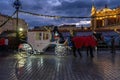 Illuminated horse drawn carriage at Main Market Square at Christmas time. Krakow Royalty Free Stock Photo