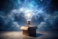 Illuminated ideas emerging from an unexpected source a glowing lightbulb ascends from a simple cardboard box against a night sky Royalty Free Stock Photo