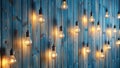 Illuminated ideas warm glowing bulbs hanging against a rustic blue wood panel background. Generative AI Royalty Free Stock Photo