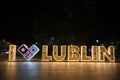 Illuminated inscription Lublin, Lubelskie ,Poland. Plac Litewski square in historic old town quarter