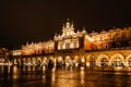 Illuminated Krakow Cloth Hall, Polish Sukiennice on main market square,Poland.Renaissance building at night during Christas. Royalty Free Stock Photo