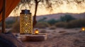 Illuminated Lantern Hanging Near Desert Campsite at Dusk Royalty Free Stock Photo