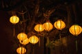 Illuminated lanterns hanging on tree at night in Hoi An ancient town , Vietnam Royalty Free Stock Photo