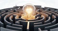 Illuminated lightbulb centered in a circular maze Royalty Free Stock Photo