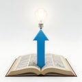 An illuminated lightbulb rising from an open book symbolizing enlightenment through knowledge Royalty Free Stock Photo