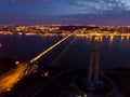 Illuminated Lisbon and 25th April Bridge Royalty Free Stock Photo