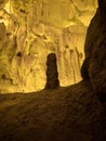 Illuminated lit lights stalagmites stalactites limestone show cave cavern Grutas da Moeda in Batalha Leiria Portugal Royalty Free Stock Photo