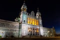 Illuminated main facade of the Almudena Cathedral, night view, Madrid, Spain. Royalty Free Stock Photo