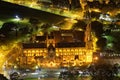 Illuminated minor basilica by night aerial view