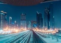 Illuminated modern architecture of Dubai downtown by night