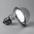Illuminated Modern Light Bulb on a Gray Background Royalty Free Stock Photo