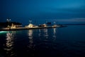 Illuminated Motorboats At Jetty In Calm Harbor In Croatia Royalty Free Stock Photo