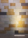 Illuminated multi colored tiled wall background