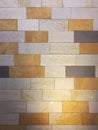 Illuminated multi colored tiled wall background