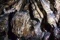 Illuminated multicolored stalactites in cave HAN-SUR-LESSE