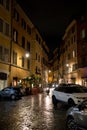Illuminated Narrow Street at Night in Rome in Italy