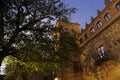 Illuminated narrow streets and Facades of historic houses in Caceres city