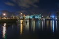 The illuminated Nemo Science Museum along the Oosterdok canal in Royalty Free Stock Photo